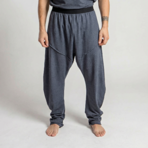Dark grey genderless drift pants in stretch jersey with elastic waistband worn by model – Graffi Drift Pants